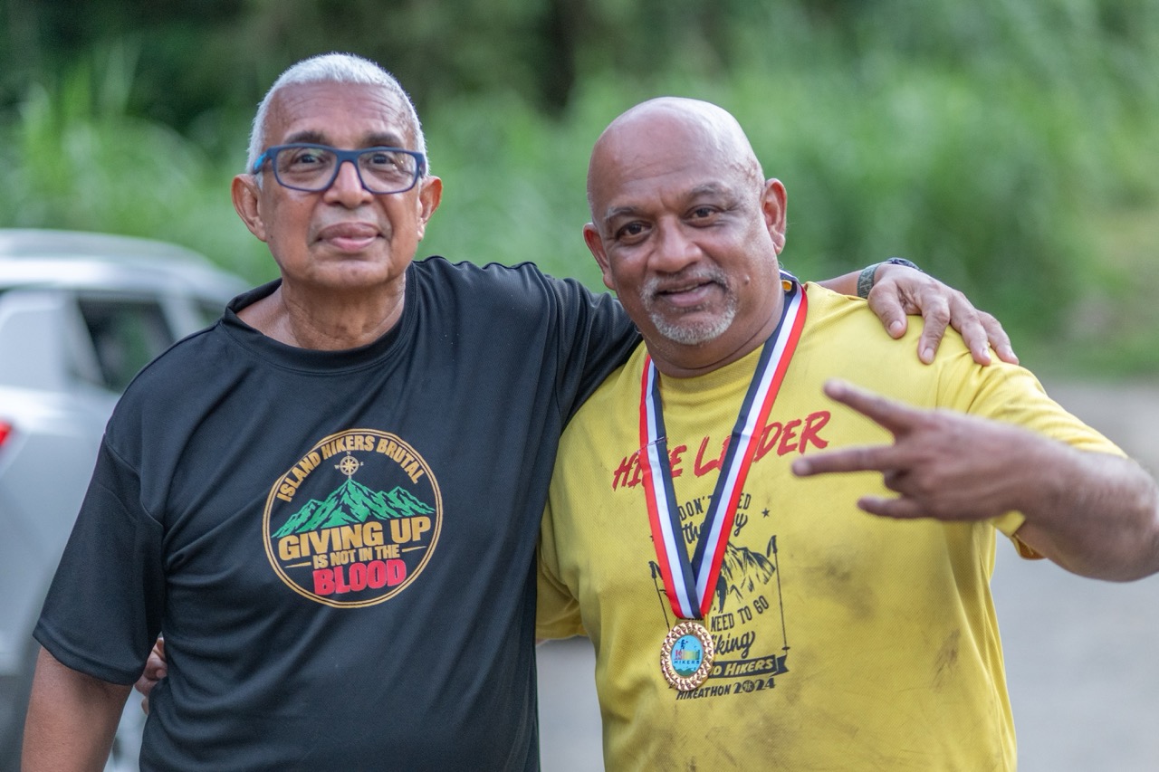 The Island Hikers hike leader with a finisher